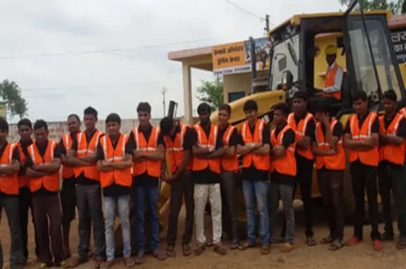 Trainees photographed outside the institute